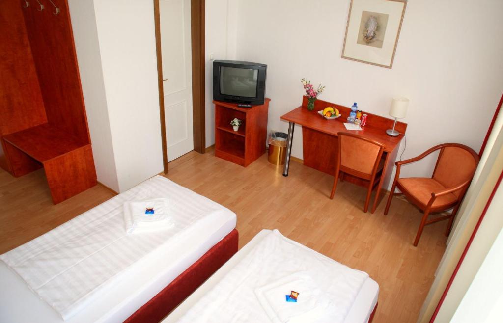 Hotel Am Ledermuseum Offenbach del Meno Habitación foto